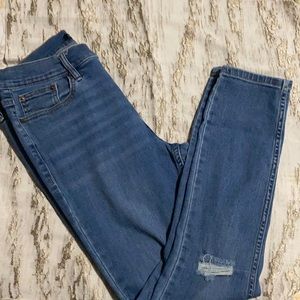 Calvin Klein knee ripped jeans